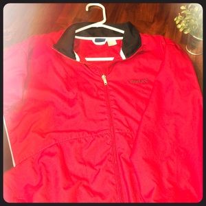 Reebok windbreaker, size M. Zip-up with pockets
